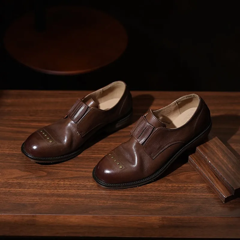 Retro Cowhide Round Toe Rivet Decorated Low Heel Loafers in Black/Brown