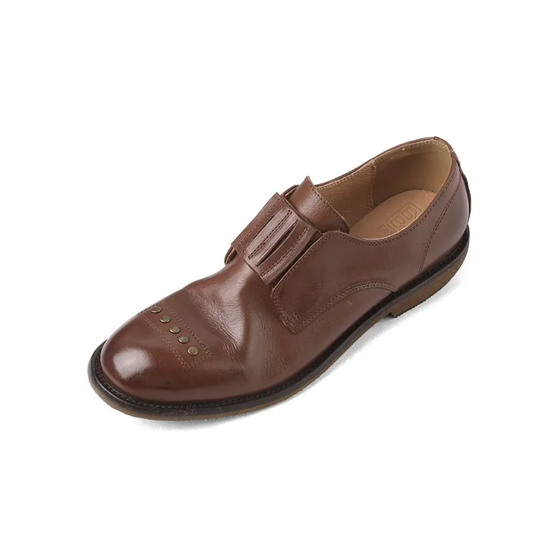 Retro Cowhide Round Toe Rivet Decorated Low Heel Loafers in Black/Brown