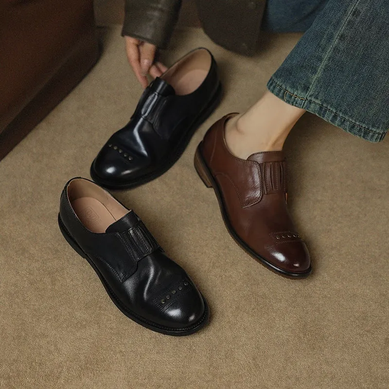 Retro Cowhide Round Toe Rivet Decorated Low Heel Loafers in Black/Brown