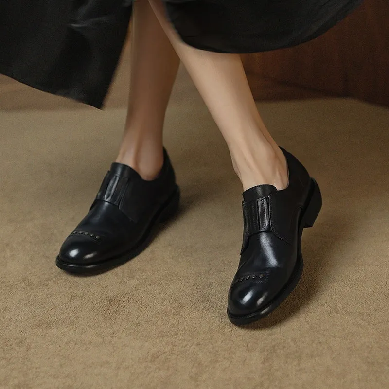 Retro Cowhide Round Toe Rivet Decorated Low Heel Loafers in Black/Brown